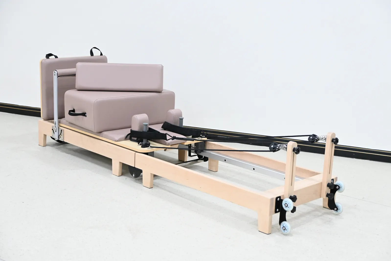 Reformer Pilates pliable pour studio et espace partagé